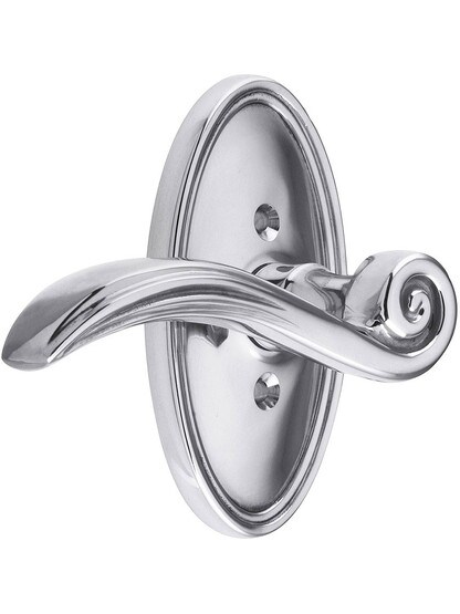 Oval Rosette Set With Elan Levers Left Hand in Polished Chrome.